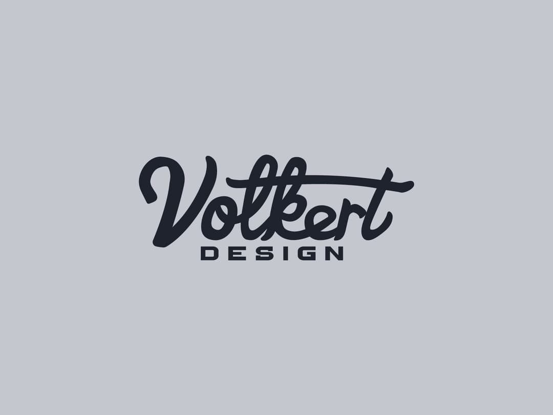 Volkert Design Logo | Nick Volkert Primary Volkert Design logo with a black script on a gray background