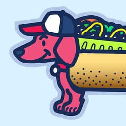 Winning Ugly Dog | Nick Volkert A smiling wiener dog wears a red, white and blue ballcap and a chicago-style hot dog costume.