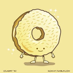 Golden Donut | Nick Volkert A donut made of gold stands proud with sparkles and sprinkles.